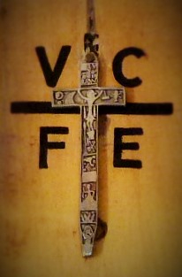 cross of matara surrounded by the letter VCFE